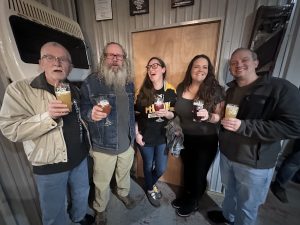 people enjoying the beer crib